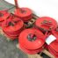 Continuous flow wall mounted hose reel